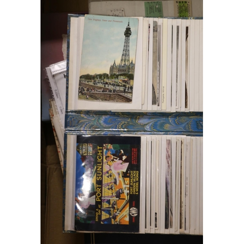 434 - Large collection of postcards to include an album of cards from the Wirral, another of Perth, an alb... 