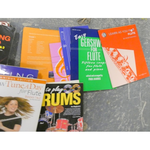 47 - Collection of music books to include flute, drums, etc.