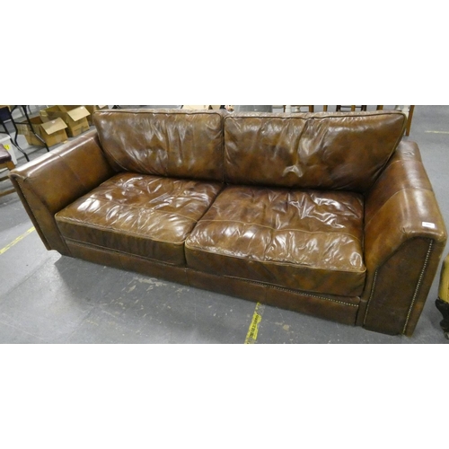 488 - Large four seater leather sofa.