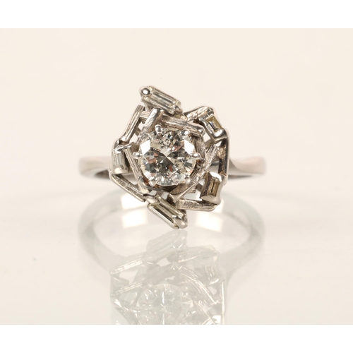 43 - 18 ct white gold diamond solitaire ring surrounded with baguette cut diamonds,  ring size ocentral d... 