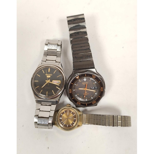 105 - Three Seiko watches to include a Seiko 5 Automatic 6309-8970, a Seiko Quartz Sports 100, and a ladie... 