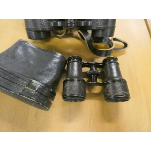 167 - Two pairs of cased vintage binoculars