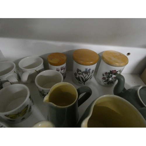 232 - Four Portmerion storage jars, mugs etc and three pieces Denby ware.