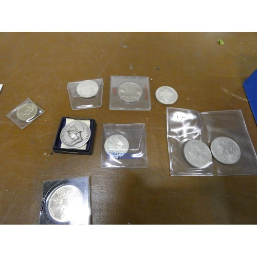 258 - Box of commemorative coins, some silver.