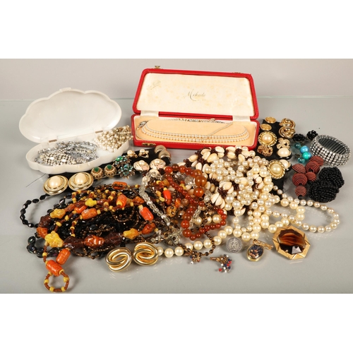 133 - Quantity of costume jewellery including clip-on earrings, brooches, pearls etc