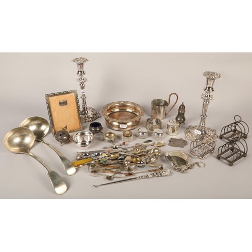 136 - Quantity of plated ware including candlesticks,