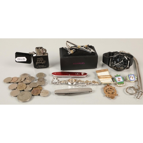 140 - Various items including Masonic medal, six pences, Meibo Quartz watch, Zippo lighter