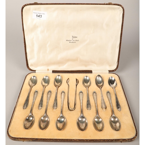 143 - Twelve Walker and Hall silver teaspoons with sugar tongs, Sheffield, 1930 in case