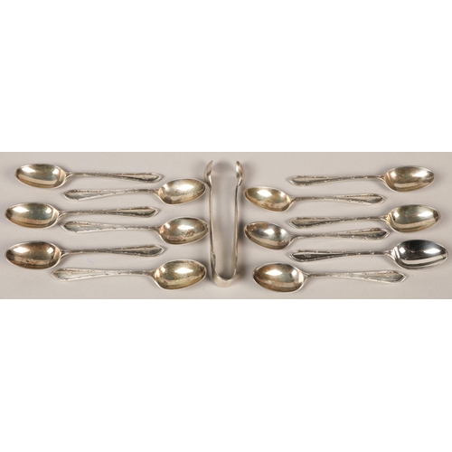 143 - Twelve Walker and Hall silver teaspoons with sugar tongs, Sheffield, 1930 in case