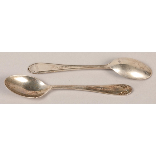 144 - Twelve silver tea spoons, Birmingham 1921 in case, set  of five sterling silver cocktail sticks... 