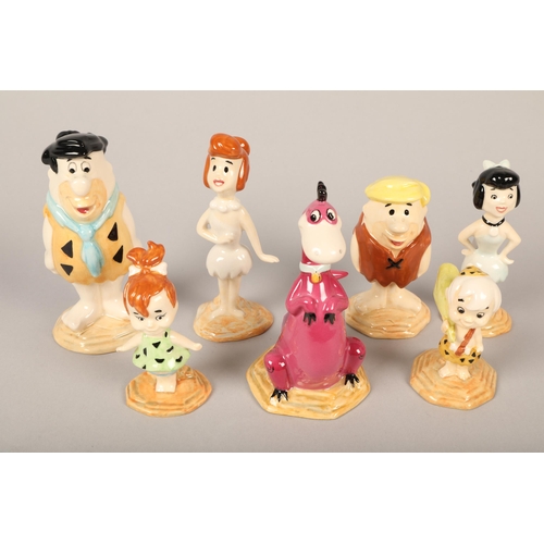 18 - Seven Flintstone John Beswick figures, including Fred, Wilma, Betty, Bamm-bamm (7)