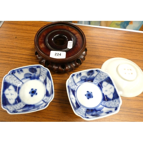 295 - Two blue and white Chinese bowls, Chinese tea cup, 6 character marks and stand.