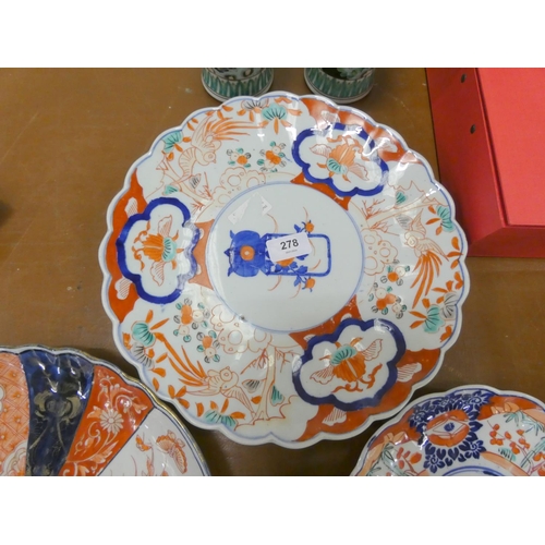 278 - Two large Imari chargers circ. 1850's 30cm dia. and a Imari Dish. 21cm