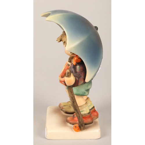 174 - Hummel figure of boy and girl with umbrella, 16 cm high