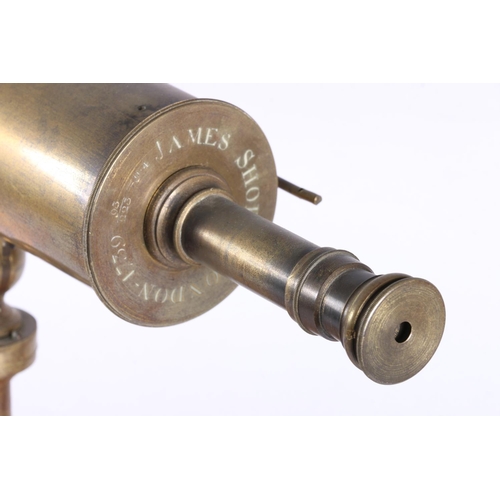 22 - James Short of London portable reflecting brass telescope, (missing lens), dated 1739 mounted on pin... 