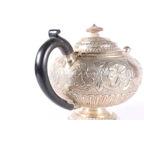 46 - Georgian silver bullet shaped teapot with all over floral decoration by Edward Thomason, Birmingham ... 