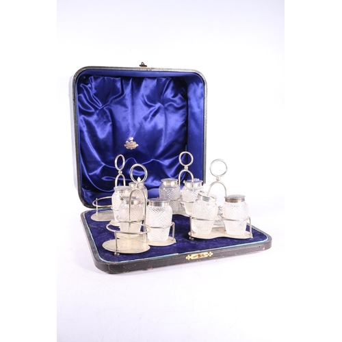 49 - Cased set of four Victorian silver mounted hobnail cut glass cruet stands, by Walter & John Barn... 