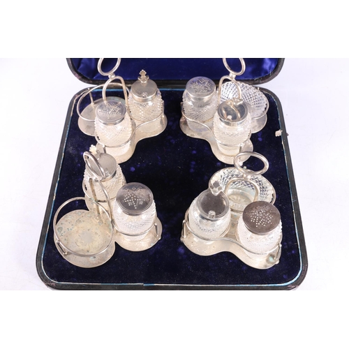 49 - Cased set of four Victorian silver mounted hobnail cut glass cruet stands, by Walter & John Barn... 