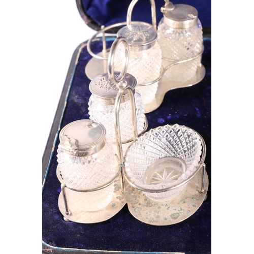 49 - Cased set of four Victorian silver mounted hobnail cut glass cruet stands, by Walter & John Barn... 