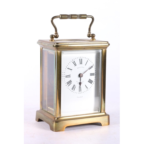 59 - French brass carriage clock with white enamel dial with Roman numeral chapter ring, retailed by Broo... 