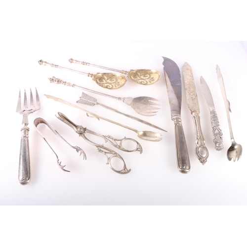 62 - Silver plated flatware to include a pair of serving spoons, carvers, grape scissors, Two George VI C... 