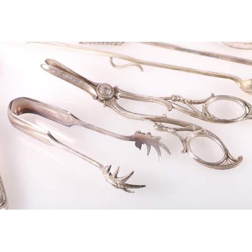 62 - Silver plated flatware to include a pair of serving spoons, carvers, grape scissors, Two George VI C... 