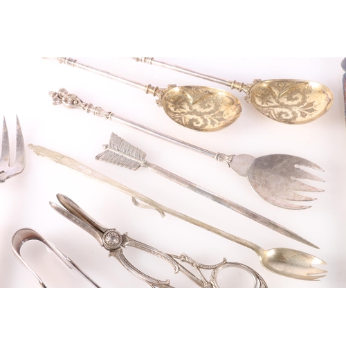 62 - Silver plated flatware to include a pair of serving spoons, carvers, grape scissors, Two George VI C... 