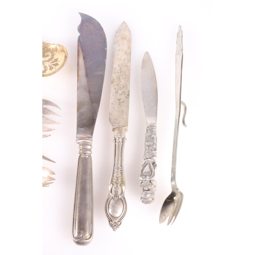 62 - Silver plated flatware to include a pair of serving spoons, carvers, grape scissors, Two George VI C... 