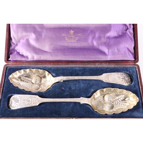 63 - Pair of silver plated berry serving spoons in fitter case by Mackay Cunningham & Co of Edinburgh... 