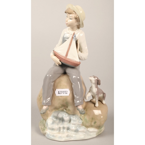 179 - Lladro Boy with sail boat and puppy, no 5166, 24 cm high