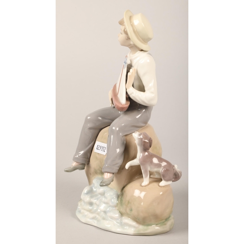 179 - Lladro Boy with sail boat and puppy, no 5166, 24 cm high