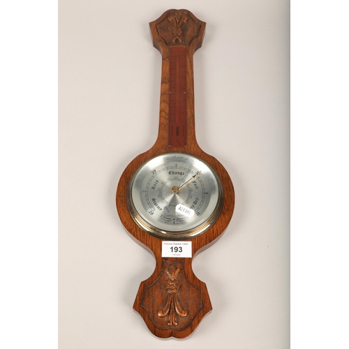 193 - Carved oak barometer