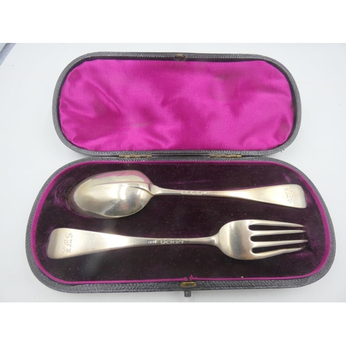 119 - Silver cased fork and spoon.