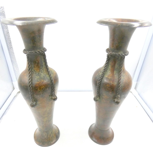 337 - Pair of cast Oriental antique vases.