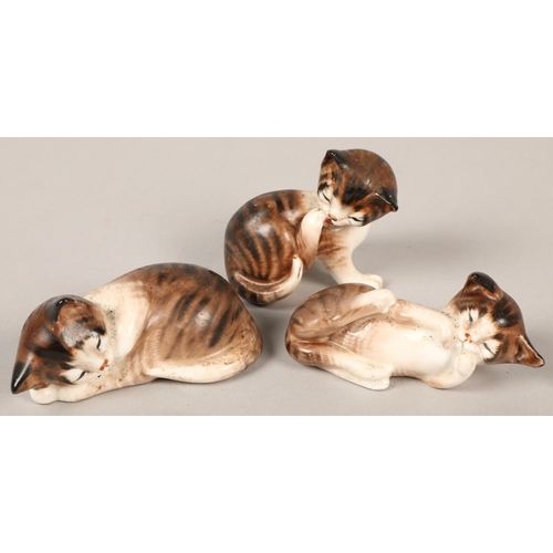 184 - Three small Royal Doulton cats, (3)