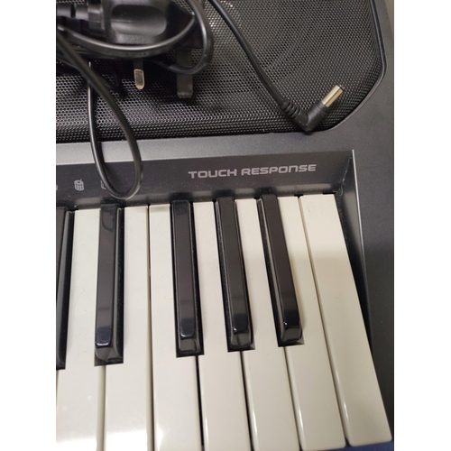 365 - Casio CTK-711 electric keyboard with stand.