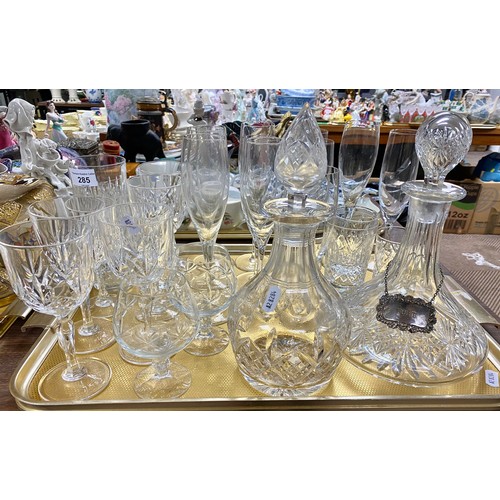 285 - Assorted glassware to include champagne flutes, crystal decanter, crystal wine glasses, etc