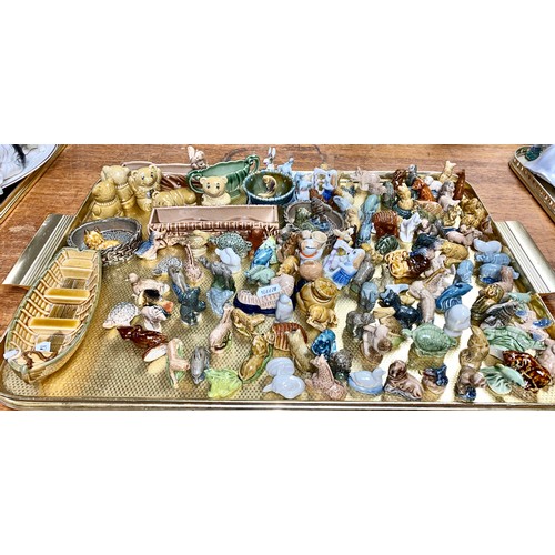 268 - Large tray of assorted animal figurines, miniature Wade twin-handled vase, various Wade ceramics, et... 