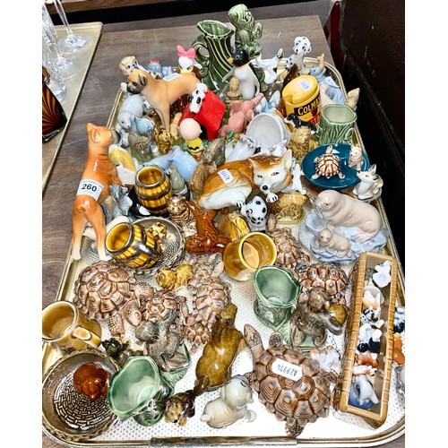 260 - Large assortment of ceramics and figurines (mostly Wade)