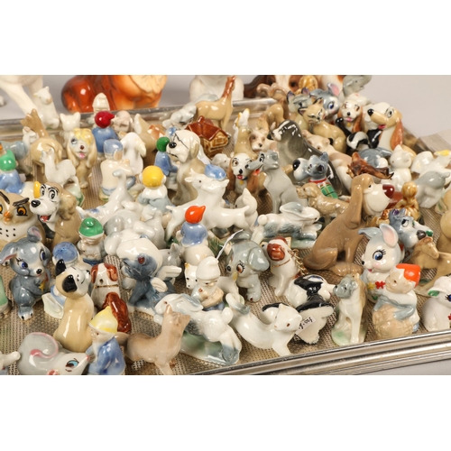 230 - Large collection of miniature Disney and other figures and six dog figures