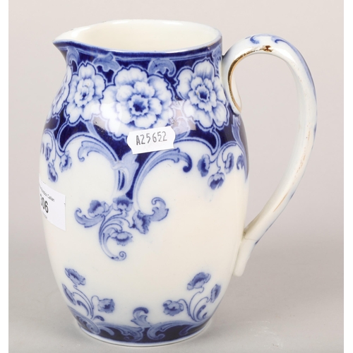 306 - Royal Doulton blue and white jug with floral decoration, 17cm height