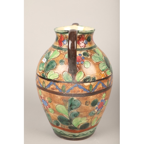 308 - Large twin-handled vase with floral design