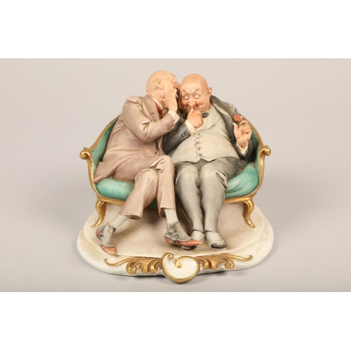 318 - Capodimonte figure of two suited men conversing