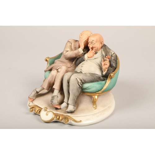 318 - Capodimonte figure of two suited men conversing