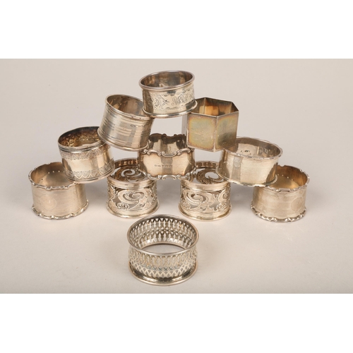 320 - Twelve silver napkin rings, 305.1g