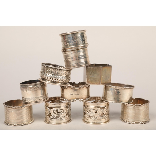 320 - Twelve silver napkin rings, 305.1g