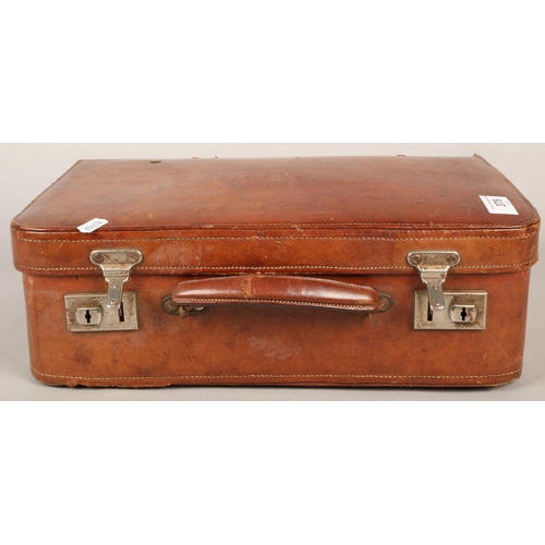 375 - Brown leather briefcase containing a variety of stamps