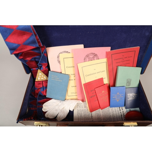 389 - Briefcase containing a variety of Masonic ephemera such as cufflinks, sashes, pamphlets, etc