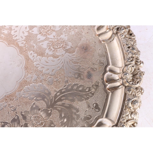 100 - Large silver plated copper salver or circular tray, the top with etched floral design and relief flo... 