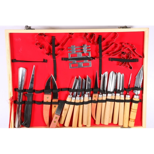 101 - Chinese made Vogue garnishing eighty piece carving tool set in original box.